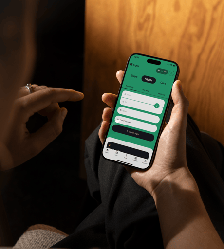 Person booking a hotel on a phone