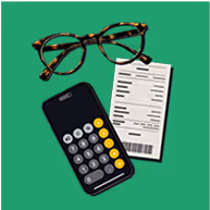 Glasses next to a calculator