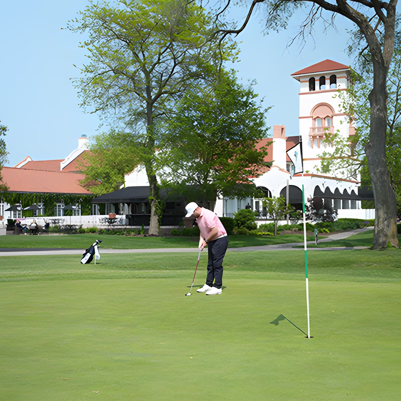Golfer teeing off on a Chicago Southland course